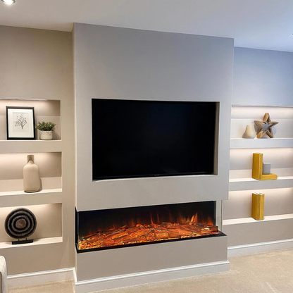 A modern wall-mounted fireplace with a black TV screen above a glowing electric firebox, set into a light gray wall with built-in shelving on both sides.